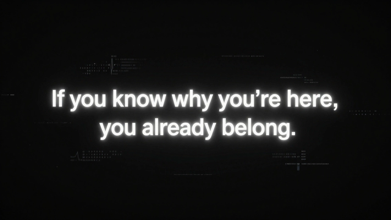 A minimalist black digital screen with glowing white text saying &#039;If you know why you’re here, you already belong.&#039;